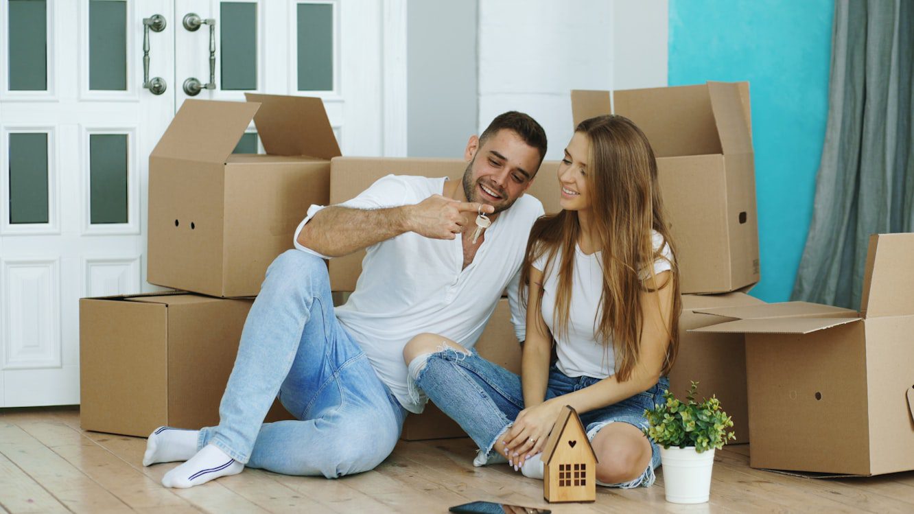 Family settling into a professionally managed Boise rental home after passing AIM tenant screening